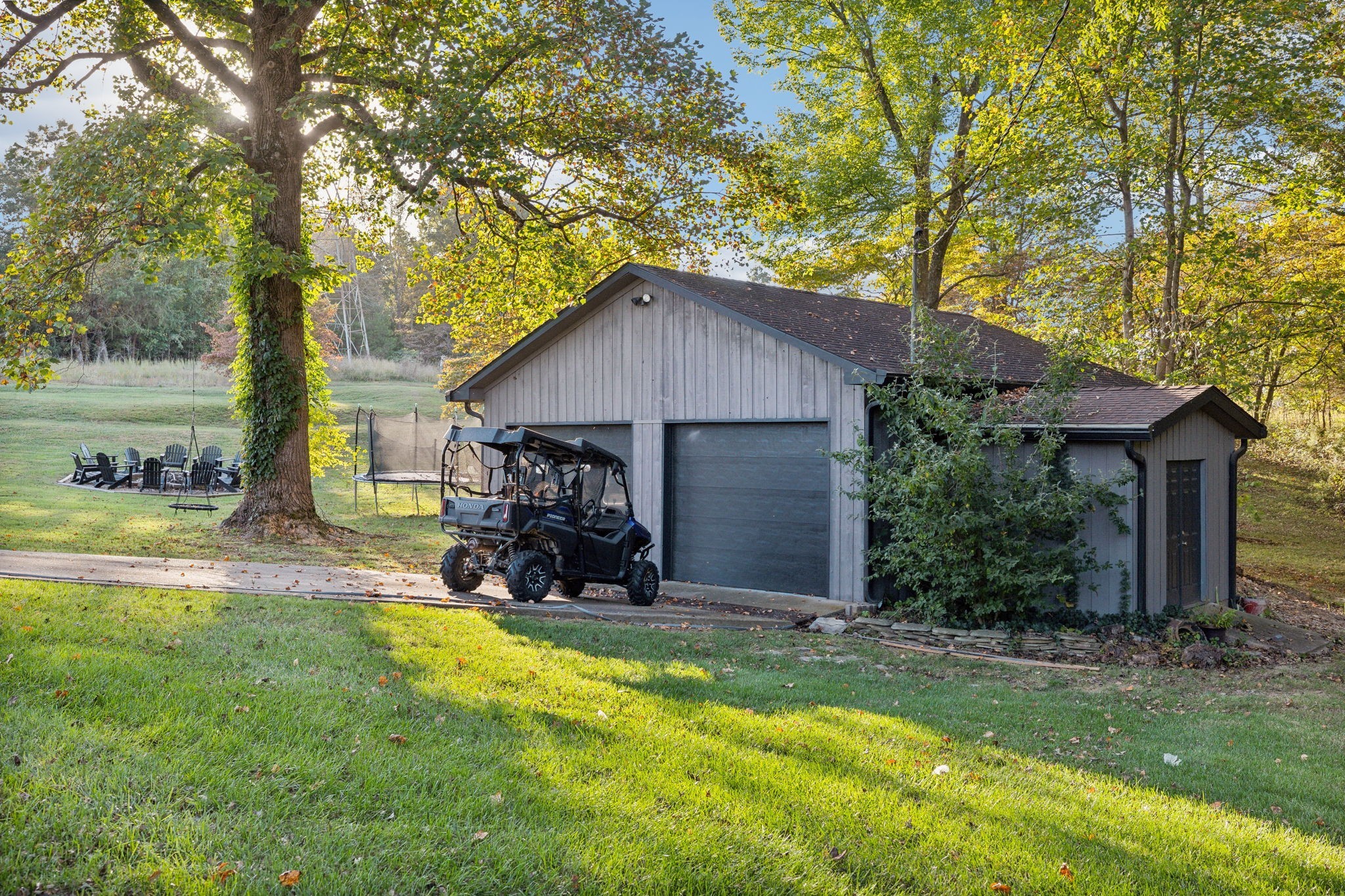 1985 Country View Chapmansboro, TN 37035 - Photo 70 of 88 a view of a house with backyard and sitting area