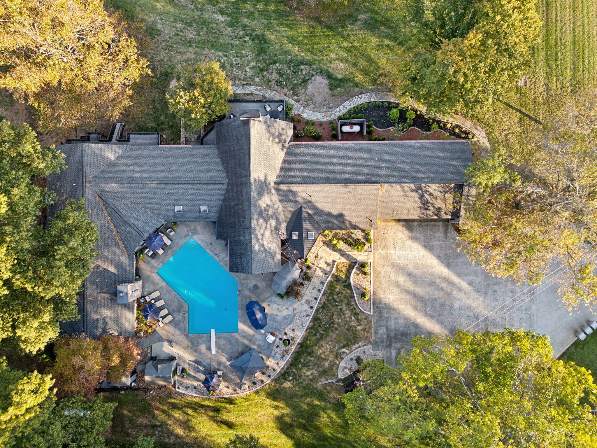 1985 Country View Chapmansboro, TN 37035 - Photo 76 of 88 a view of a house with a yard and a large tree