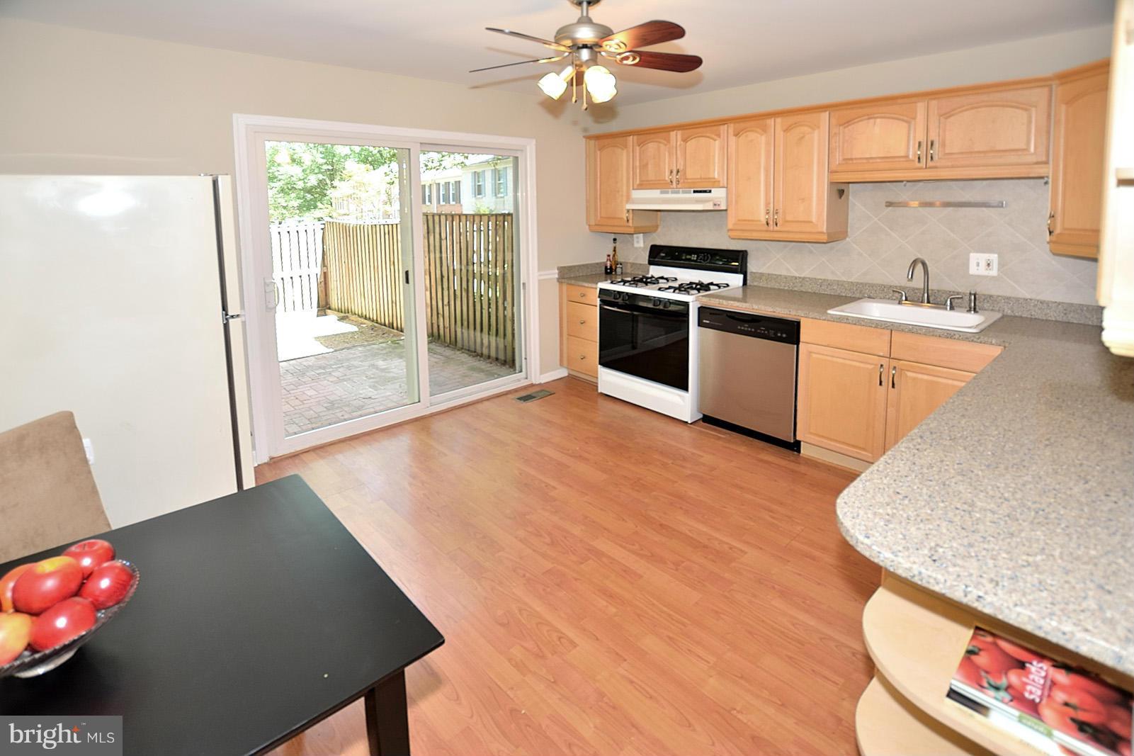 11936 Travistock Court Reston, VA 20191 - Photo 6 of 30 Sliding glass door to backyard patio