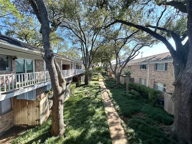 a view of a street with sitting area