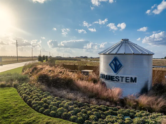 a view of a lake with a yard