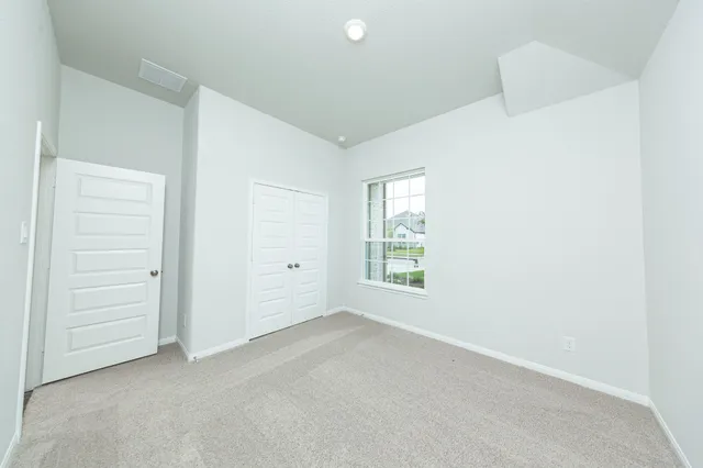 an empty room with windows