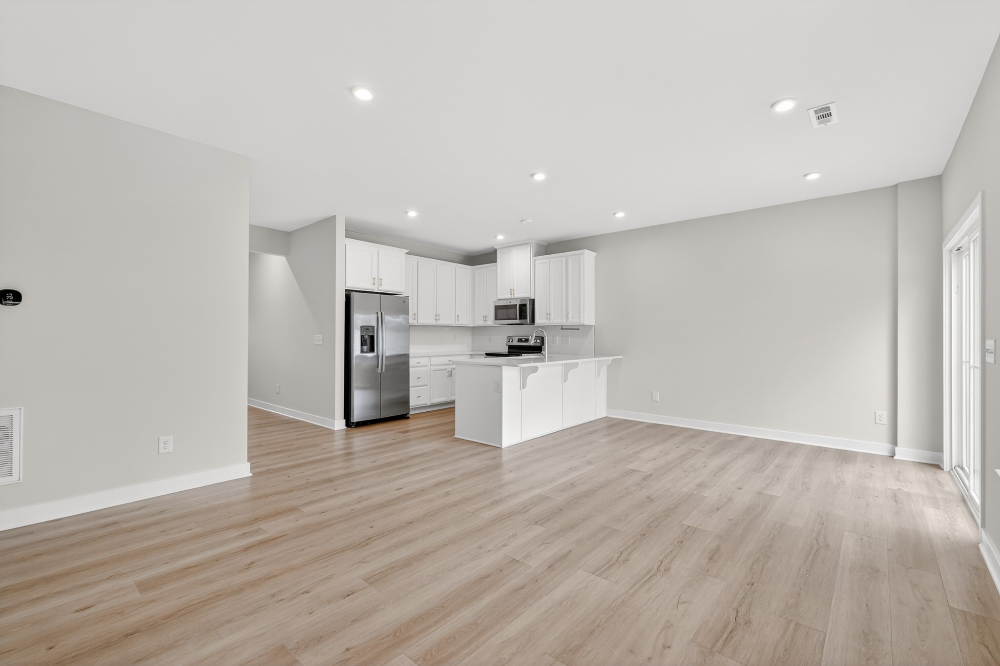 1085 Duncan Street Gallatin, TN 37066 - Photo 13 of 35 a view of kitchen with wooden floor