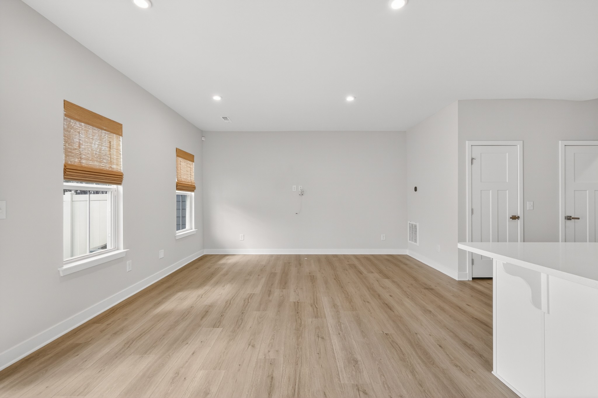 1085 Duncan Street Gallatin, TN 37066 - Photo 15 of 35 an empty room with wooden floor and windows