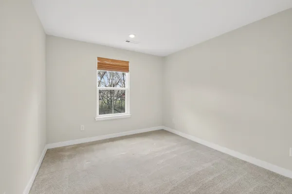 a view of backyard with green space