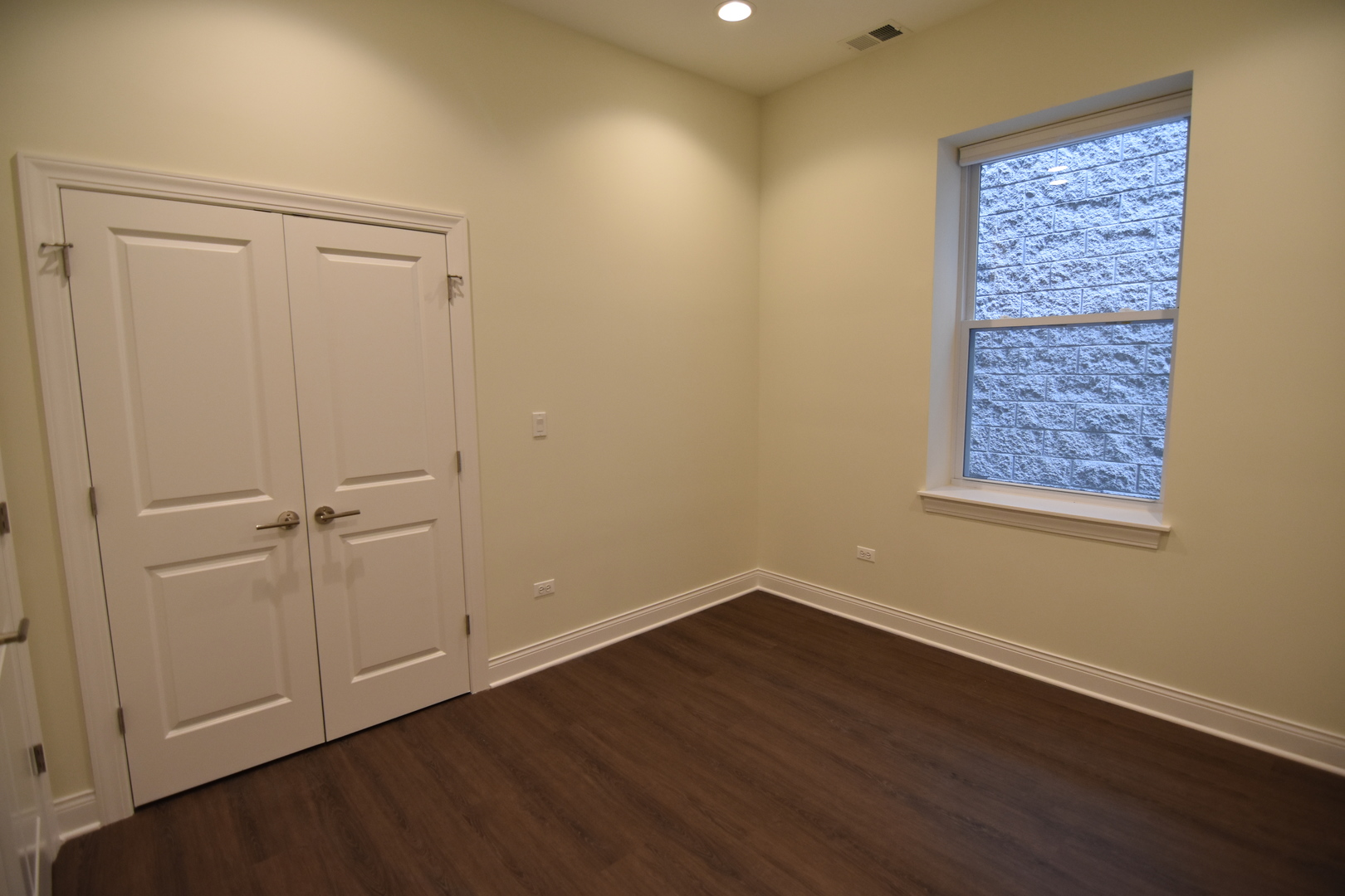 Undisclosed Address Chicago, IL 60657 - Photo 13 of 18 a view of an empty room with closet and a window