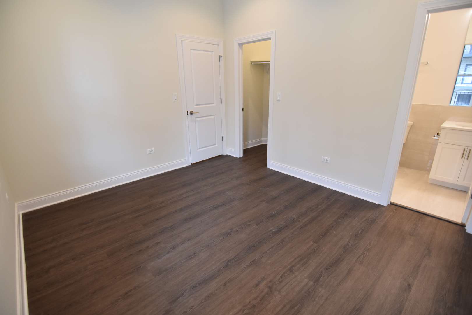Undisclosed Address Chicago, IL 60657 - Photo 17 of 18 an empty room with wooden floor