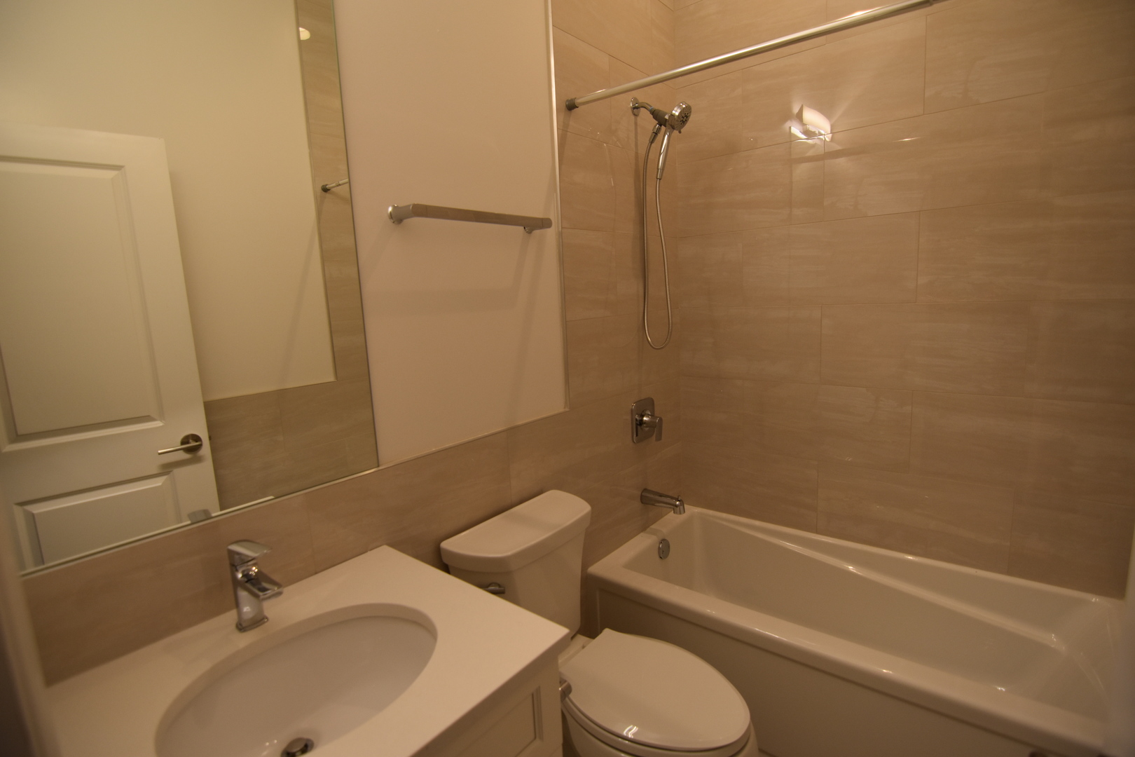 Undisclosed Address Chicago, IL 60657 - Photo 10 of 18 a bathroom with a sink toilet and shower