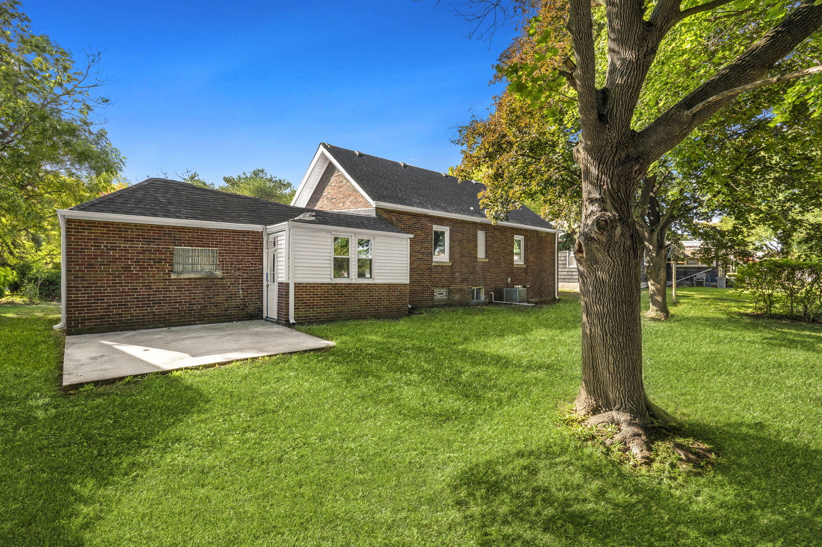 3540 Bernice Road Lansing, IL 60438 - Photo 14 of 17 a front view of house with yard and green space