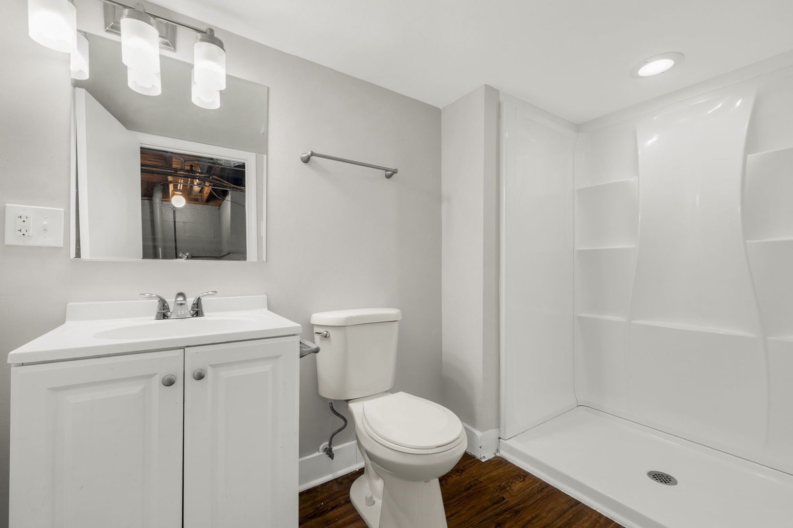 3540 Bernice Road Lansing, IL 60438 - Photo 10 of 17 a bathroom with a toilet sink and mirror