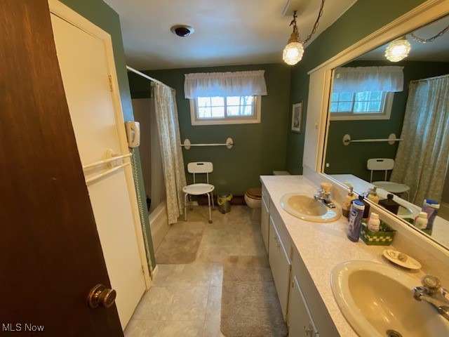 183 Trails End Road Toronto, OH 43964 - Photo 15 of 25 Full bathroom with toilet, vanity, and shower / bath combo