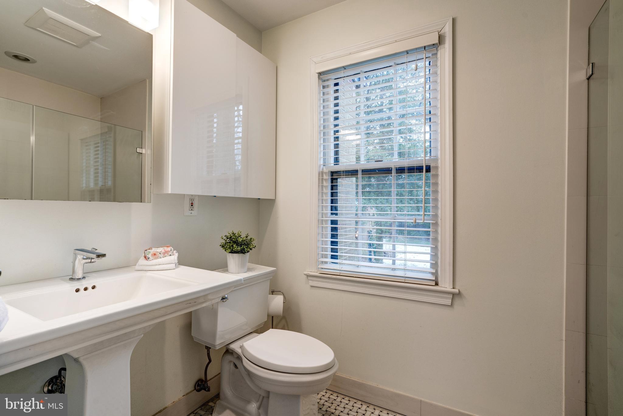 5026 Reno Road Northwest Washington, DC 20008 - Photo 14 of 30 Renovated primary bathroom