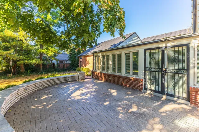 a view of a room with window chandelier