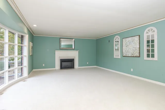 a kitchen with stainless steel appliances a refrigerator and cabinets