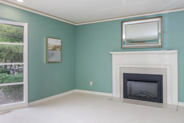 a large kitchen with stainless steel appliances granite countertop a refrigerator a sink a stove a microwave and island