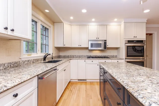 a view of a hallway with closet area