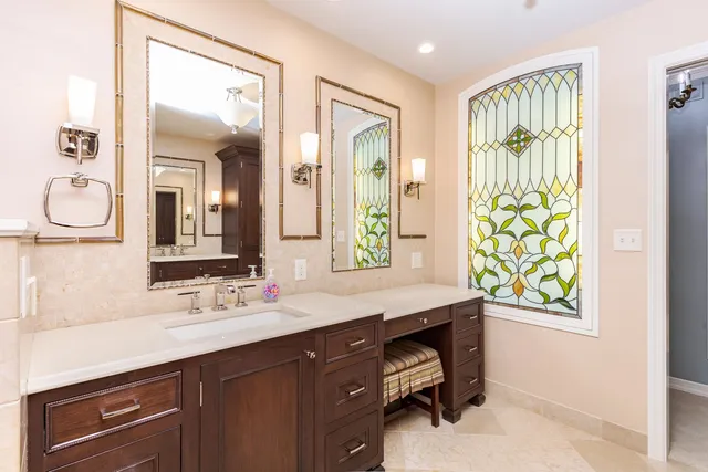 a view of a house with a swimming pool and a yard