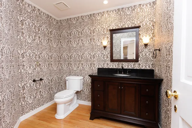 a view of a house with swimming pool next to a yard