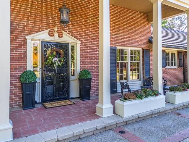 a view of an empty room with a fireplace