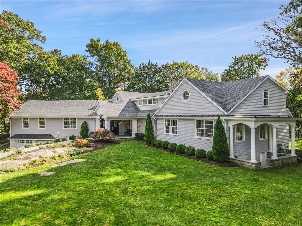 11 Dorchester Road Rye, NY 10580 - Photo 1 of 1 a front view of a house with a garden