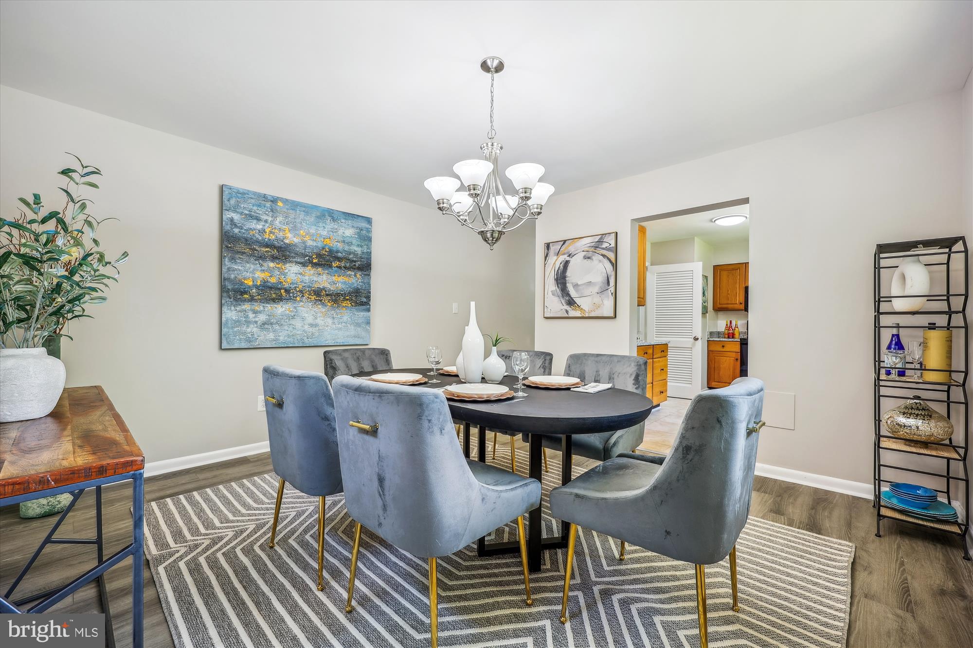 905 Kenbrook Drive Silver Spring, MD 20902 - Photo 13 of 47 a view of a dining room with furniture and chandelier