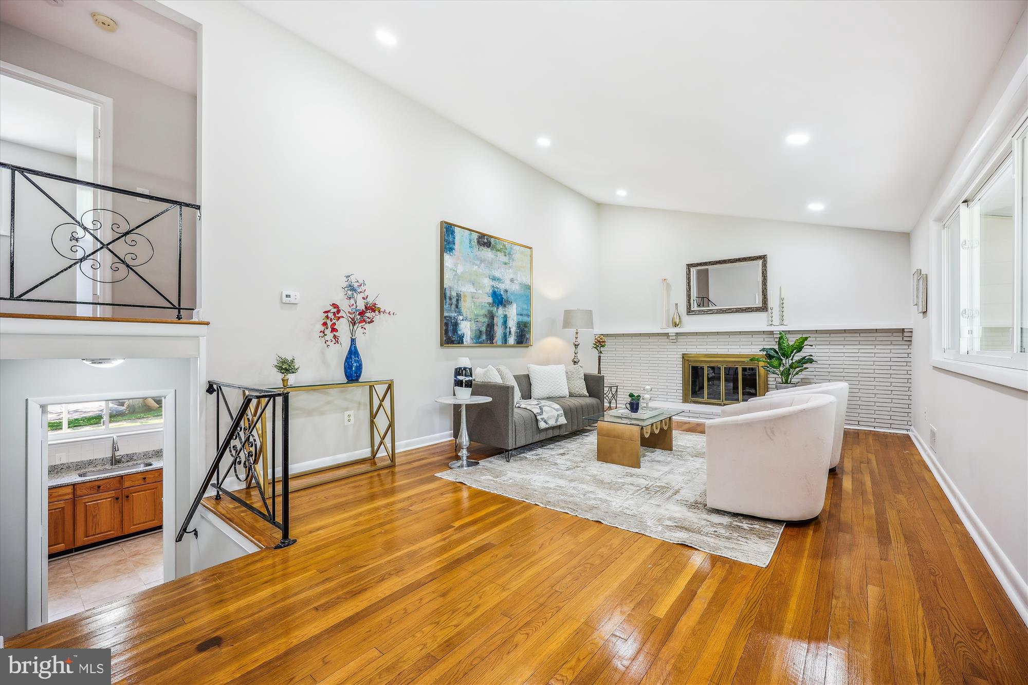 905 Kenbrook Drive Silver Spring, MD 20902 - Photo 16 of 47 a living room with furniture and a wooden floor