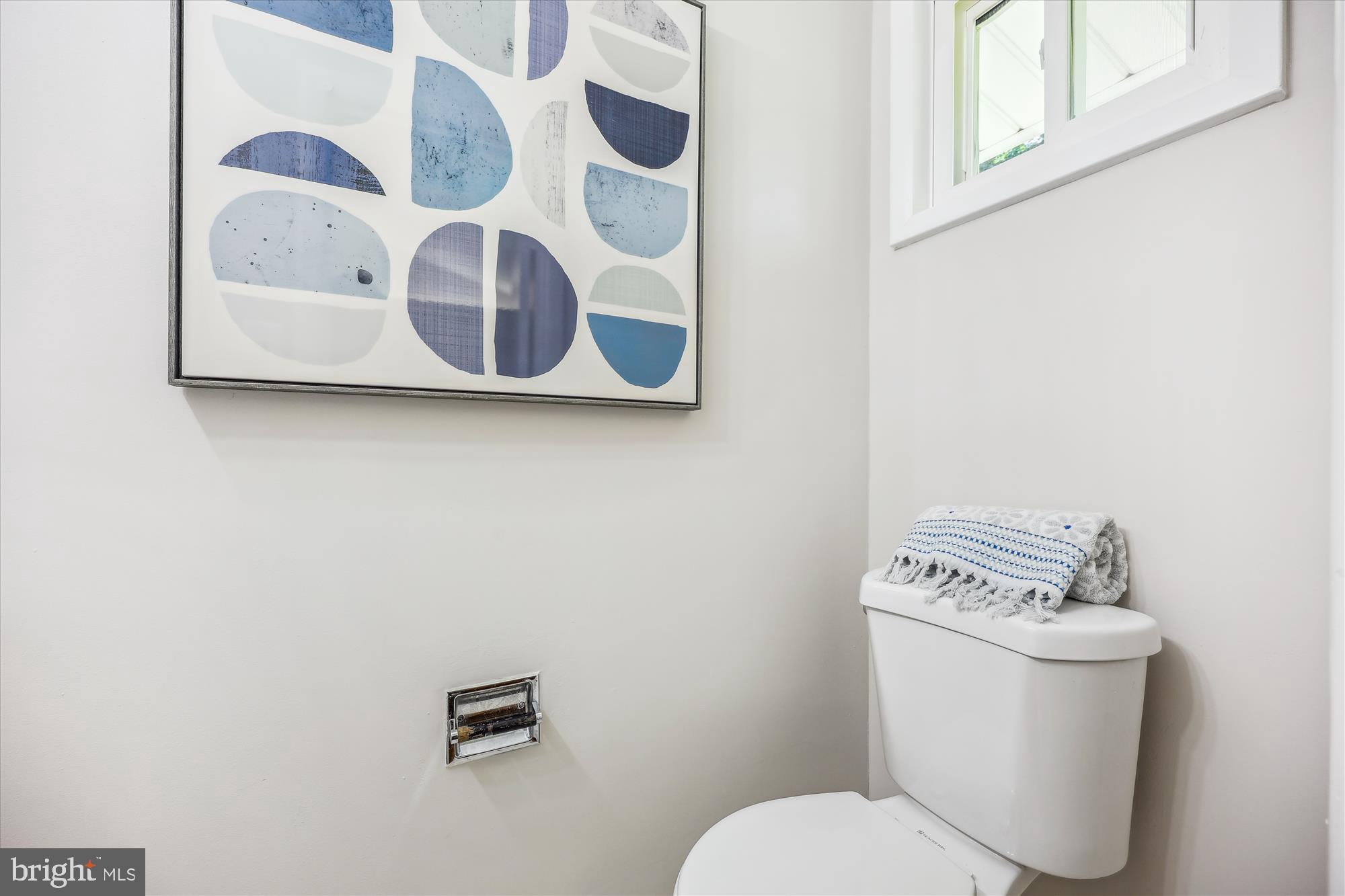 905 Kenbrook Drive Silver Spring, MD 20902 - Photo 24 of 47 a white toilet sitting next to a window