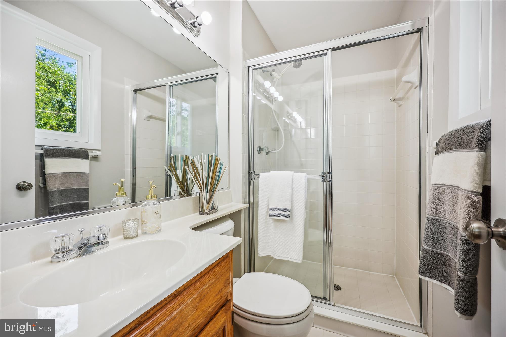 905 Kenbrook Drive Silver Spring, MD 20902 - Photo 30 of 47 a bathroom with a sink toilet and shower