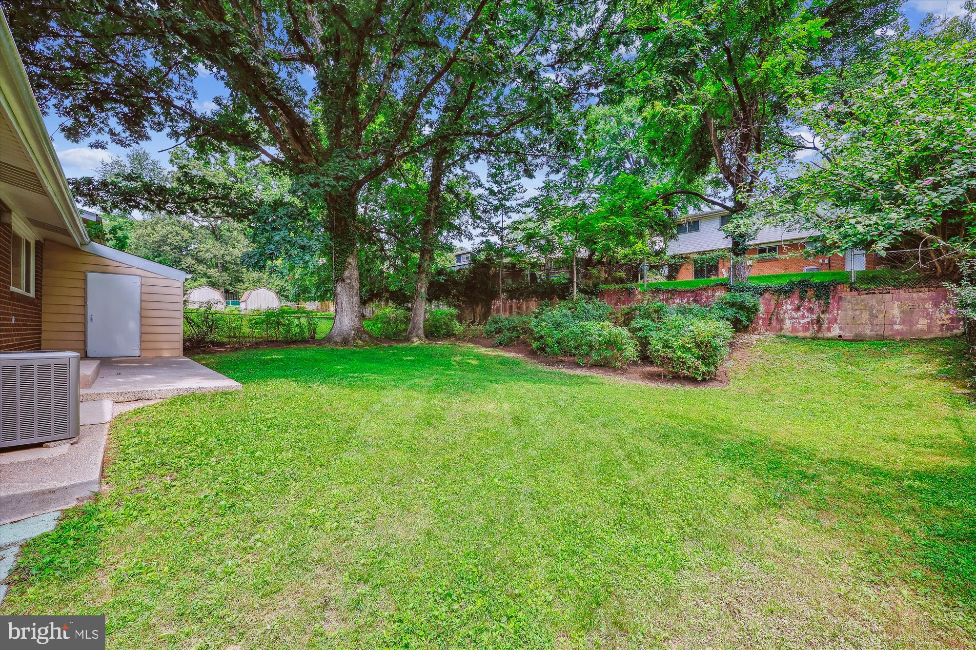 905 Kenbrook Drive Silver Spring, MD 20902 - Photo 45 of 47 a view of a house with a yard and a tree