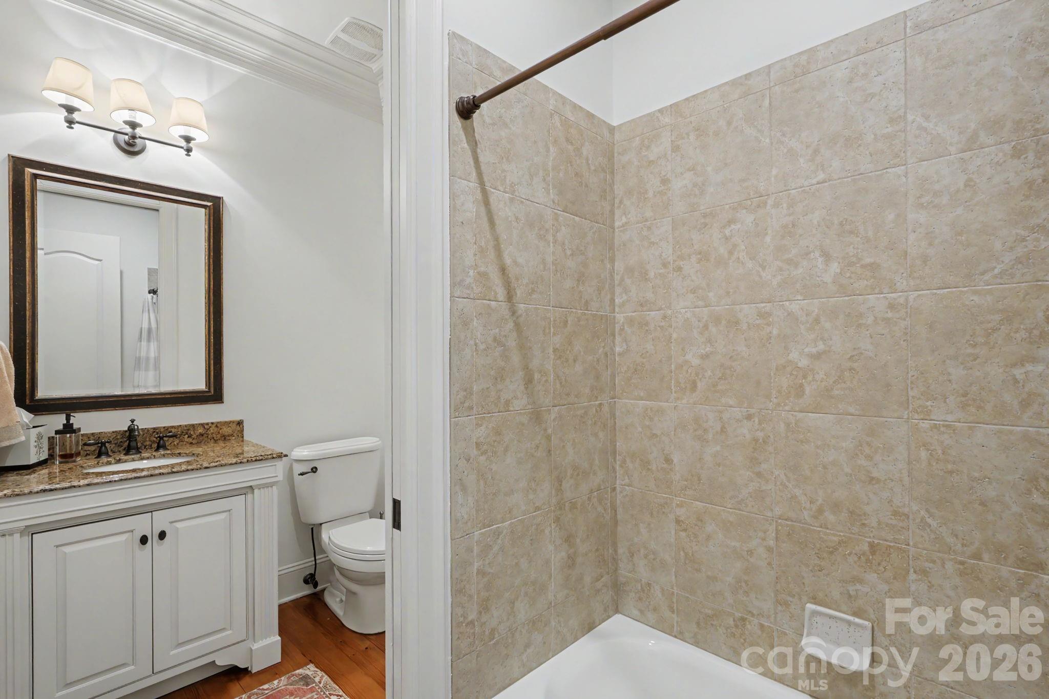 508 Hideaway Ridge Court Matthews, NC 28105 - Photo 8 of 47 a bathroom with a granite countertop sink toilet and shower