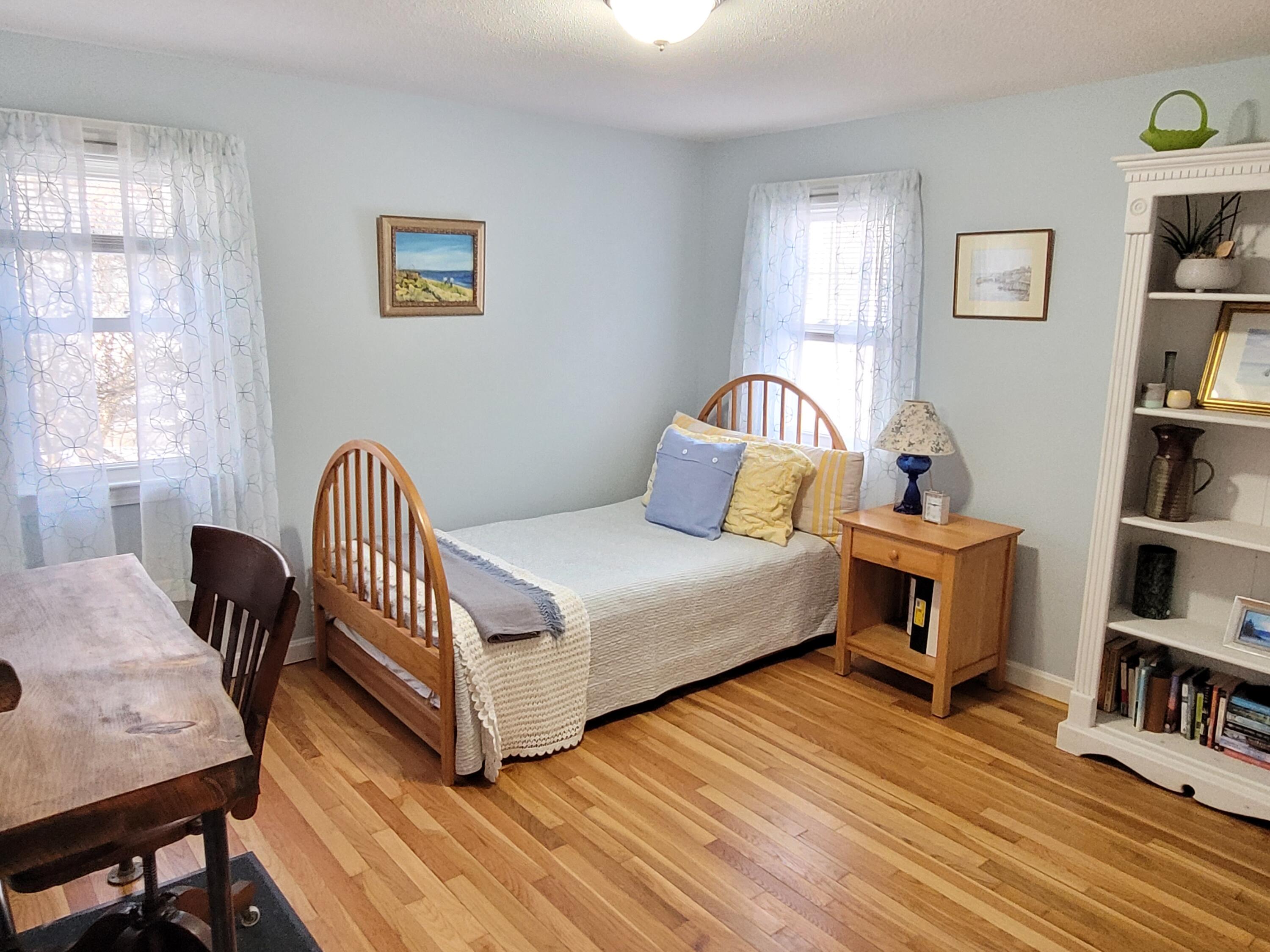 70 Trowbridge Path West Yarmouth, MA 02673 - Photo 21 of 69 a bedroom with furniture and a book shelf