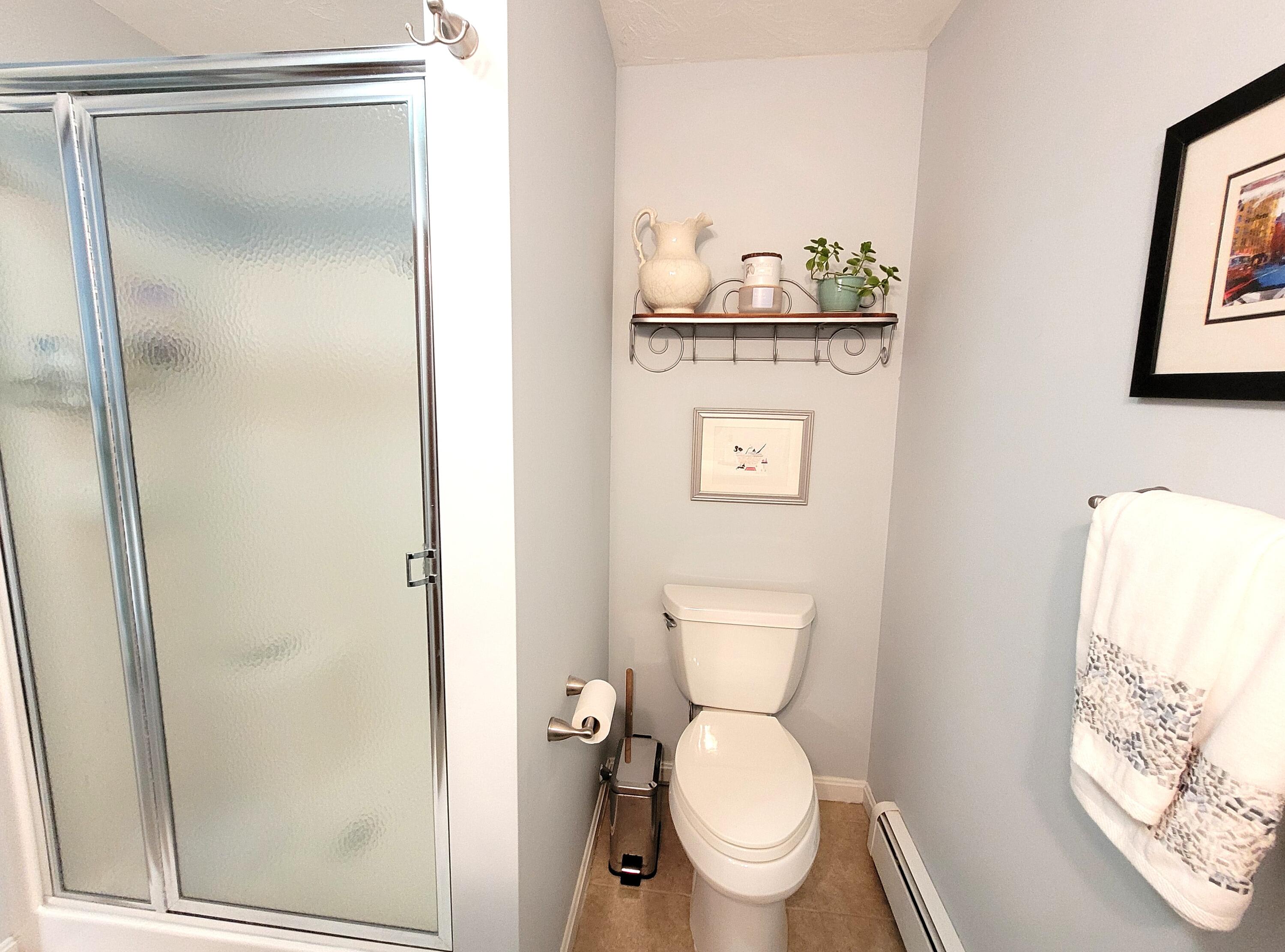 70 Trowbridge Path West Yarmouth, MA 02673 - Photo 36 of 69 a white toilet sitting next to a bathroom sink