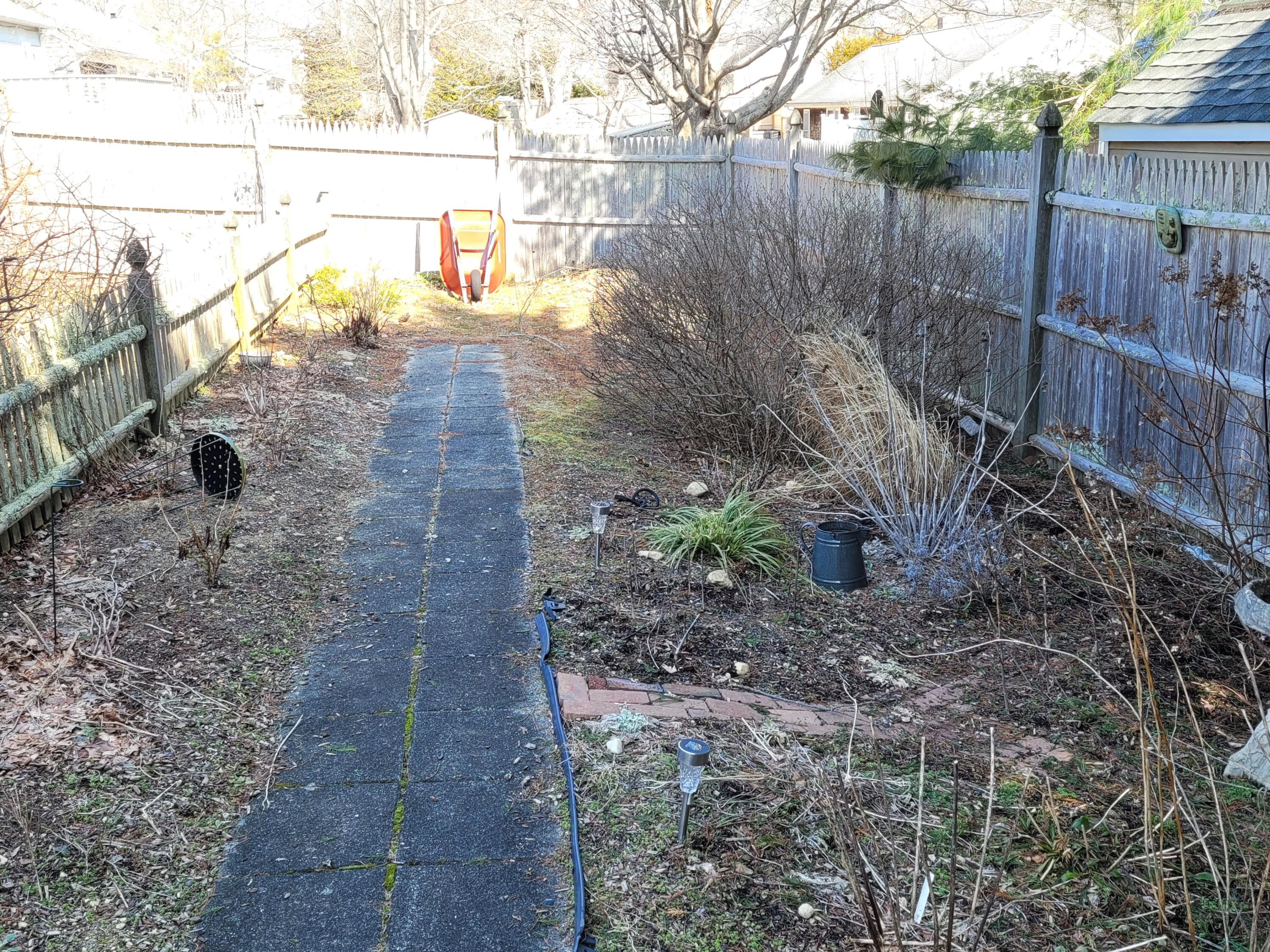70 Trowbridge Path West Yarmouth, MA 02673 - Photo 57 of 69 a view of a yard with wooden fence