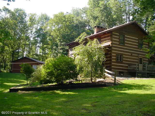 193 Elk Lake Road Meshoppen, PA 18630 - Photo 12 of 12 a backyard of a house with lots of green space