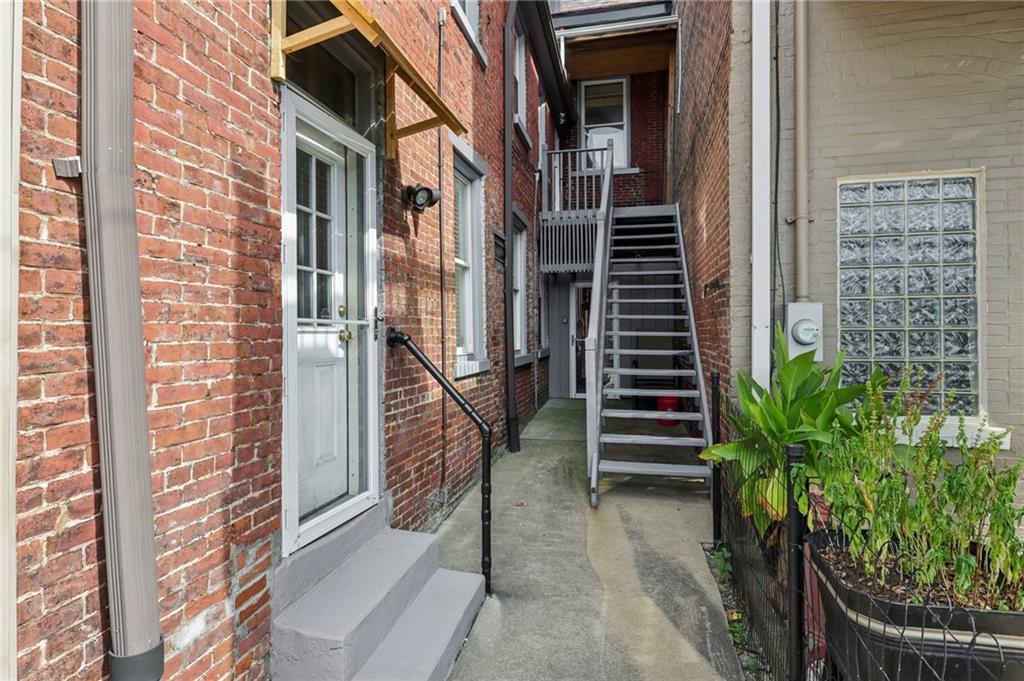 4723 Butler Street Pittsburgh, PA 15201 - Photo 41 of 47 a view of a pathway along the building