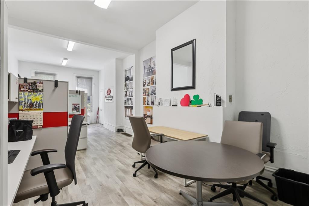 4723 Butler Street Pittsburgh, PA 15201 - Photo 8 of 47 a living room with furniture and a wooden floor