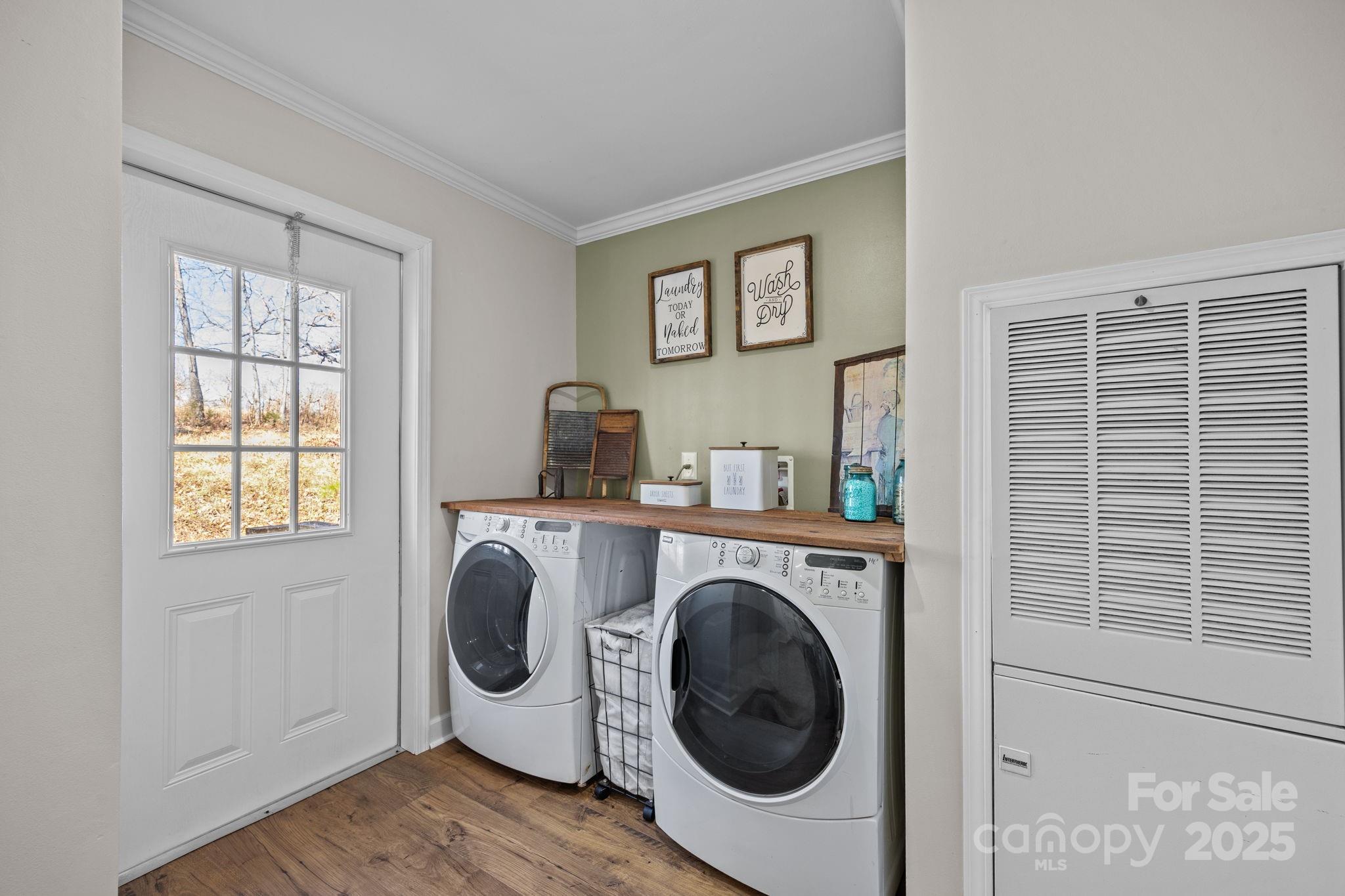 247 Aden Green Road Mill Spring, NC 28756 - Photo 33 of 48 a view of livingroom with washer and dryer