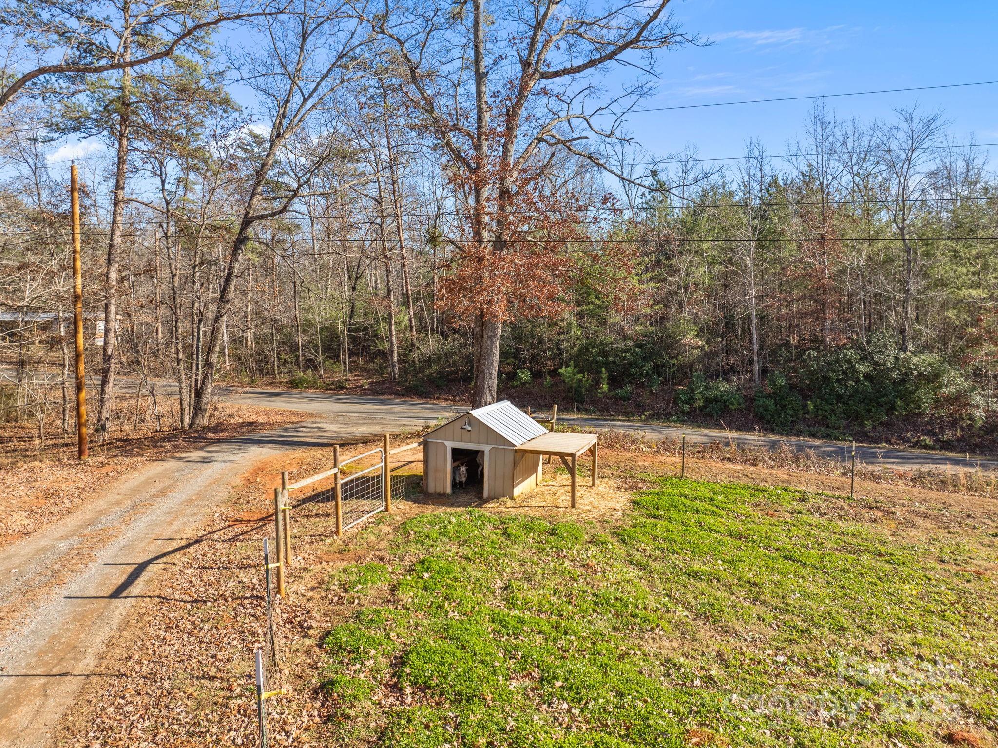 247 Aden Green Road Mill Spring, NC 28756 - Photo 42 of 48 a view of a swimming pool with a yard