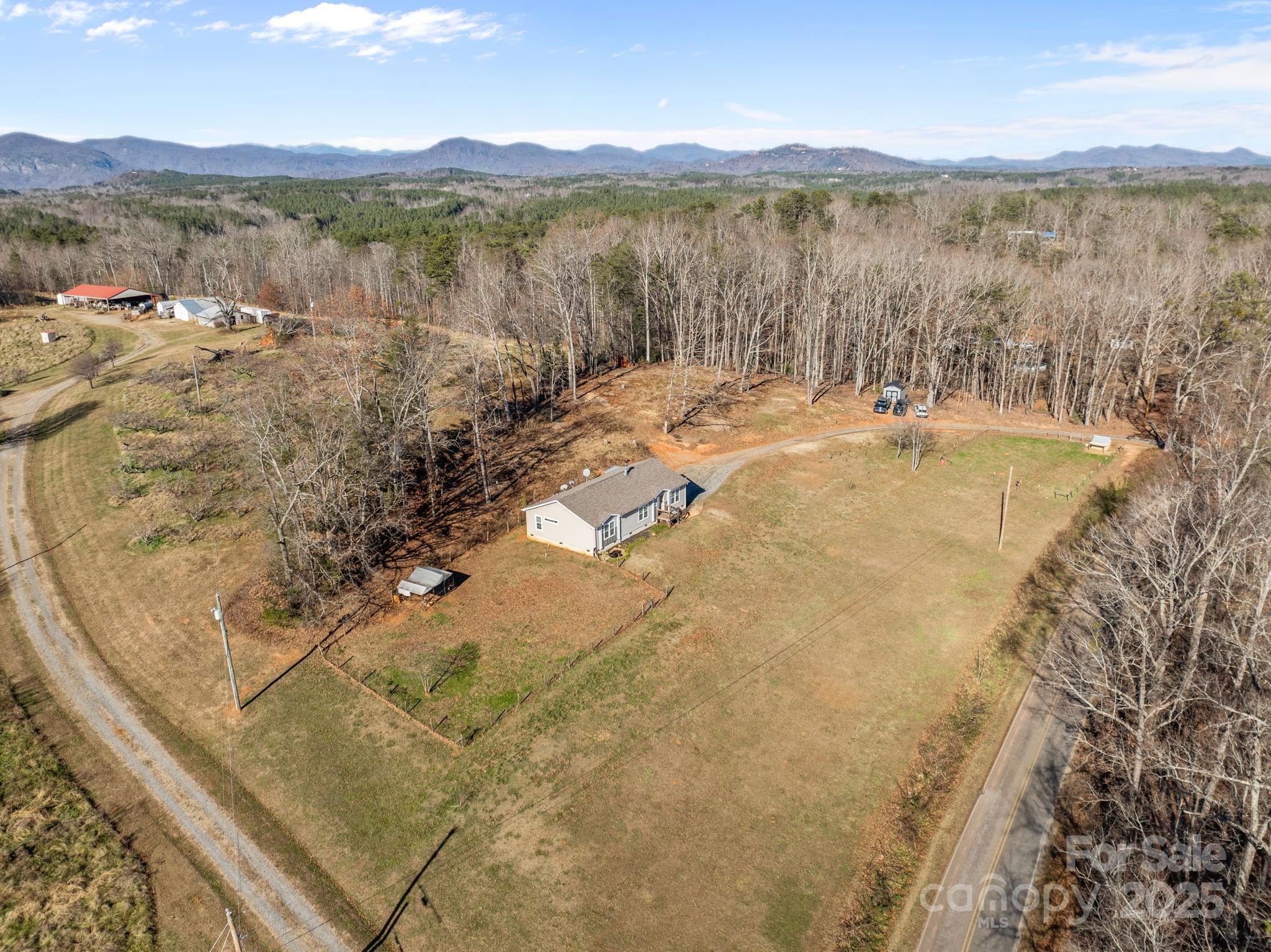 247 Aden Green Road Mill Spring, NC 28756 - Photo 47 of 48 a view of lake with mountain