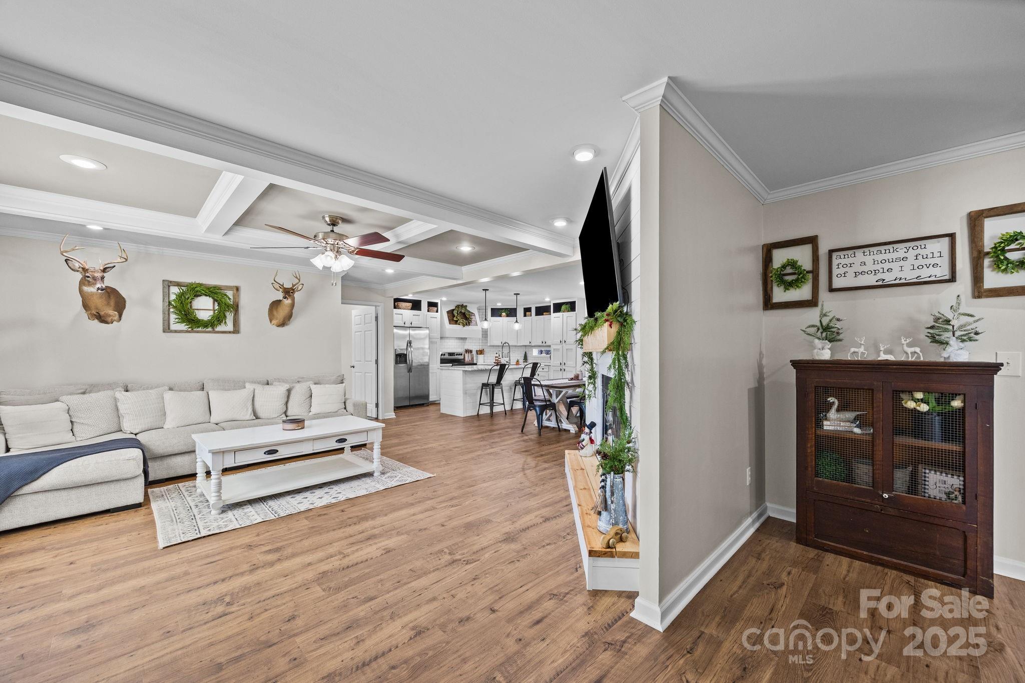 247 Aden Green Road Mill Spring, NC 28756 - Photo 6 of 48 a living room with furniture and wooden floor