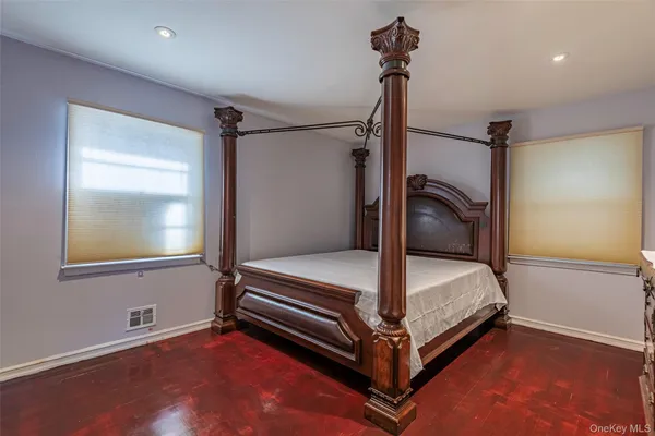 a bedroom with a bunk bed and a dresser