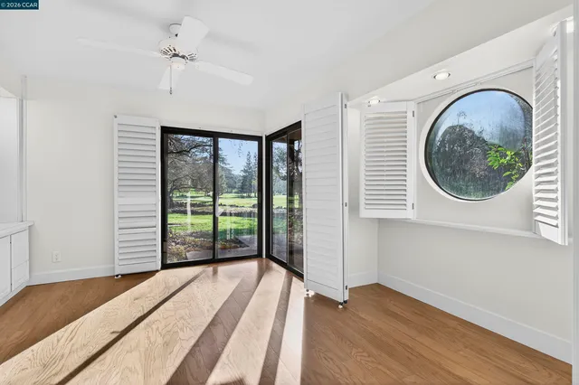a kitchen with stainless steel appliances granite countertop a refrigerator stove and cabinets