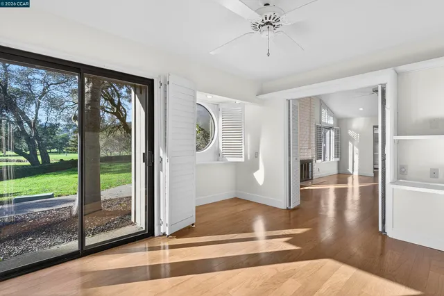 a bathroom with a granite countertop sink and washing machine