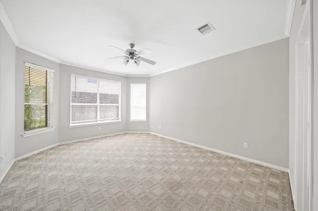 a spacious bathroom with a double vanity sink mirror and double