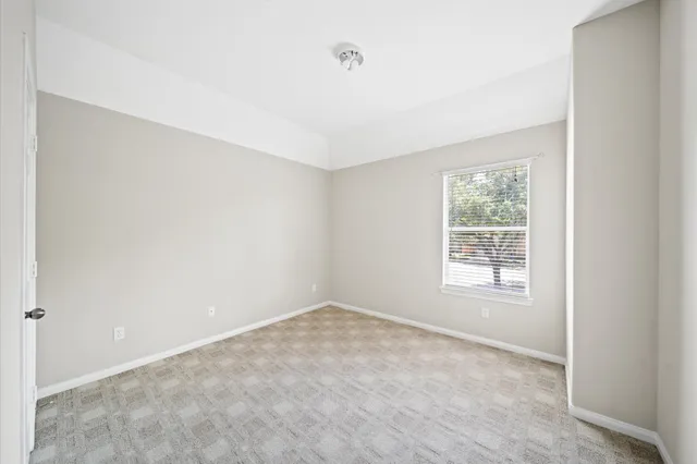 a bathroom with a bathtub and a sink