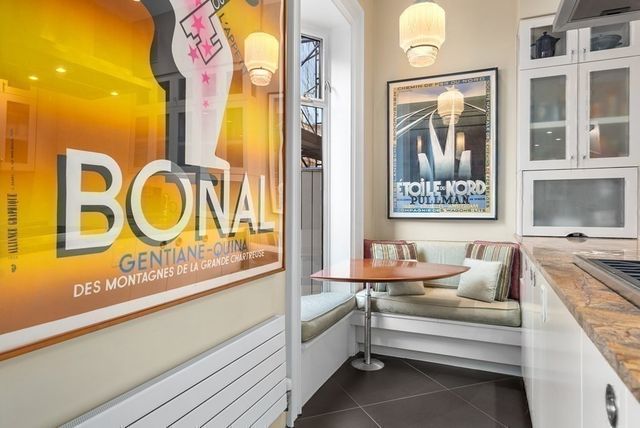 a backyard of a house with outdoor seating