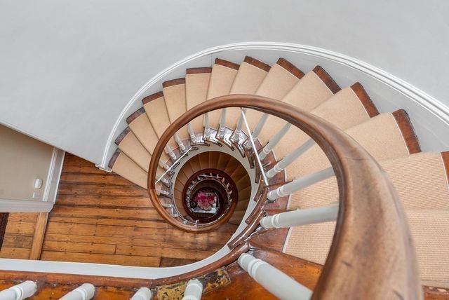 a bathroom with a shower and a toilet