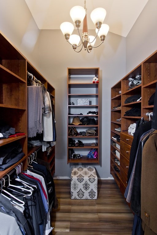 98 Greenwich Road Ware, MA 01082 - Photo 17 of 22 a view of walk in closet with clothes and shoes