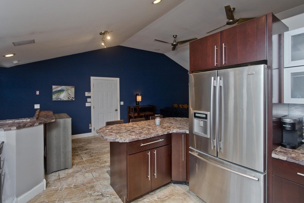 98 Greenwich Road Ware, MA 01082 - Photo 6 of 22 a kitchen with stainless steel appliances granite countertop a refrigerator a stove and a sink