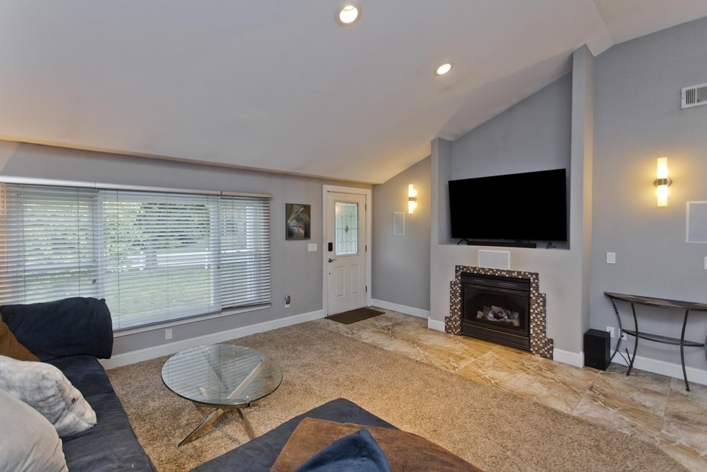 98 Greenwich Road Ware, MA 01082 - Photo 7 of 22 a living room with furniture and a flat screen tv